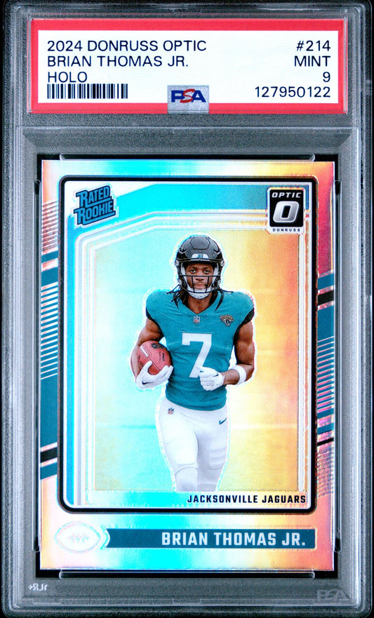 Brian Thomas Jr. rookie PSA 9 2024 Donruss Optic Rated Rookie Holo #214 - front of slab