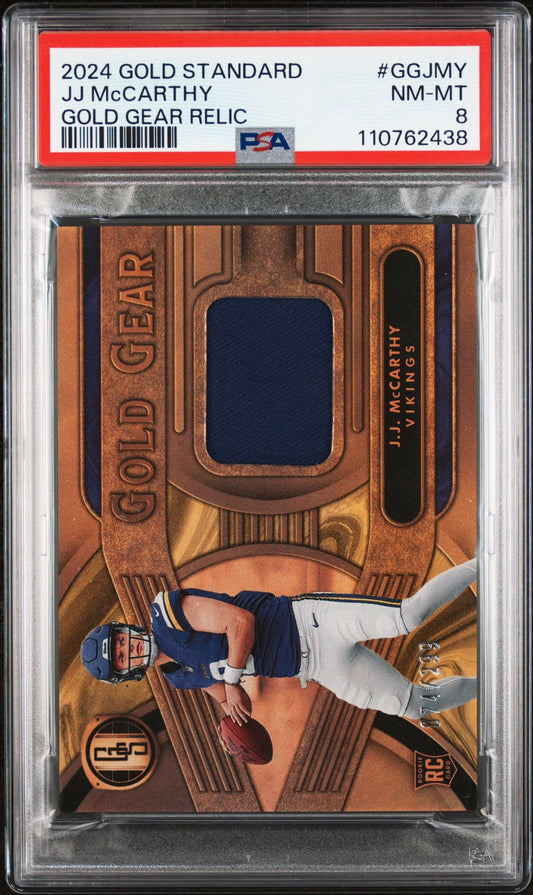 J.J. McCarthy Rookie Relic PSA 8 2024 Panini Gold Standard Gold Gear #GGJMY /299 front